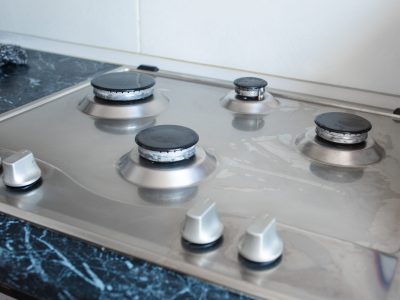 Perfectly clean gas cooker after being washed with polishing chemicals. The result of washing the burners.